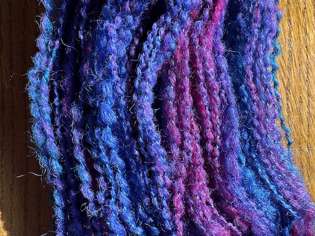 A skein of thread-plied yarn